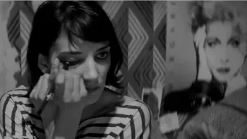 A Girl Walks Home Alone at Night